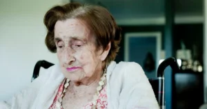 image of elderly woman looking sad